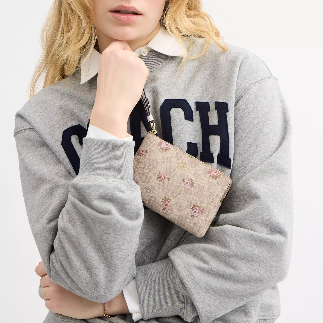 Coach Corner Zip Wristlet In Signature Canvas With Floral Print (Pre-venta)