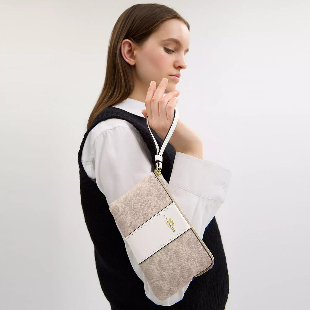 Coach Corner Zip Wristlet In Signature Canvas With Stripe