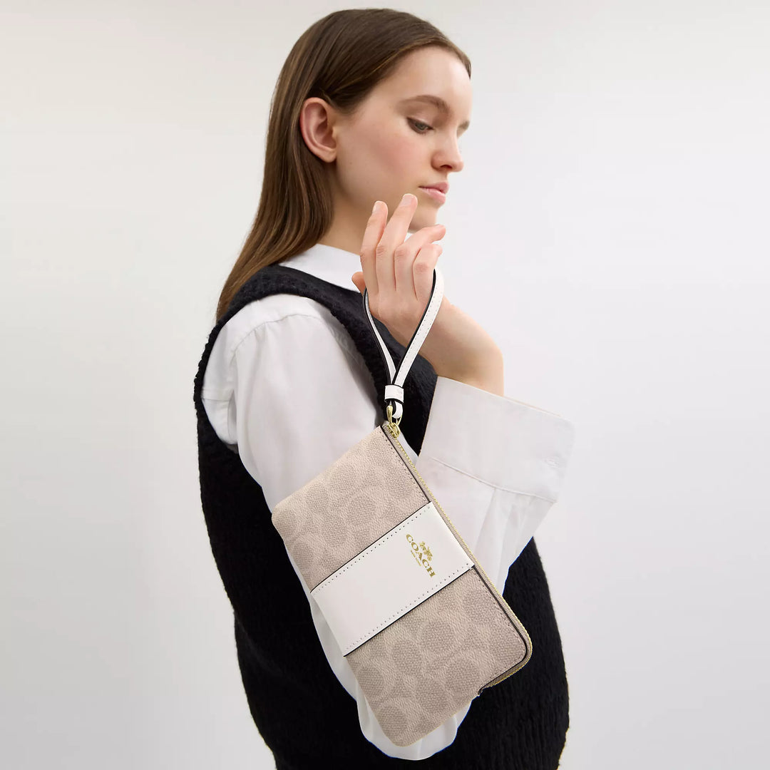 Coach Corner Zip Wristlet In Signature Canvas With Stripe